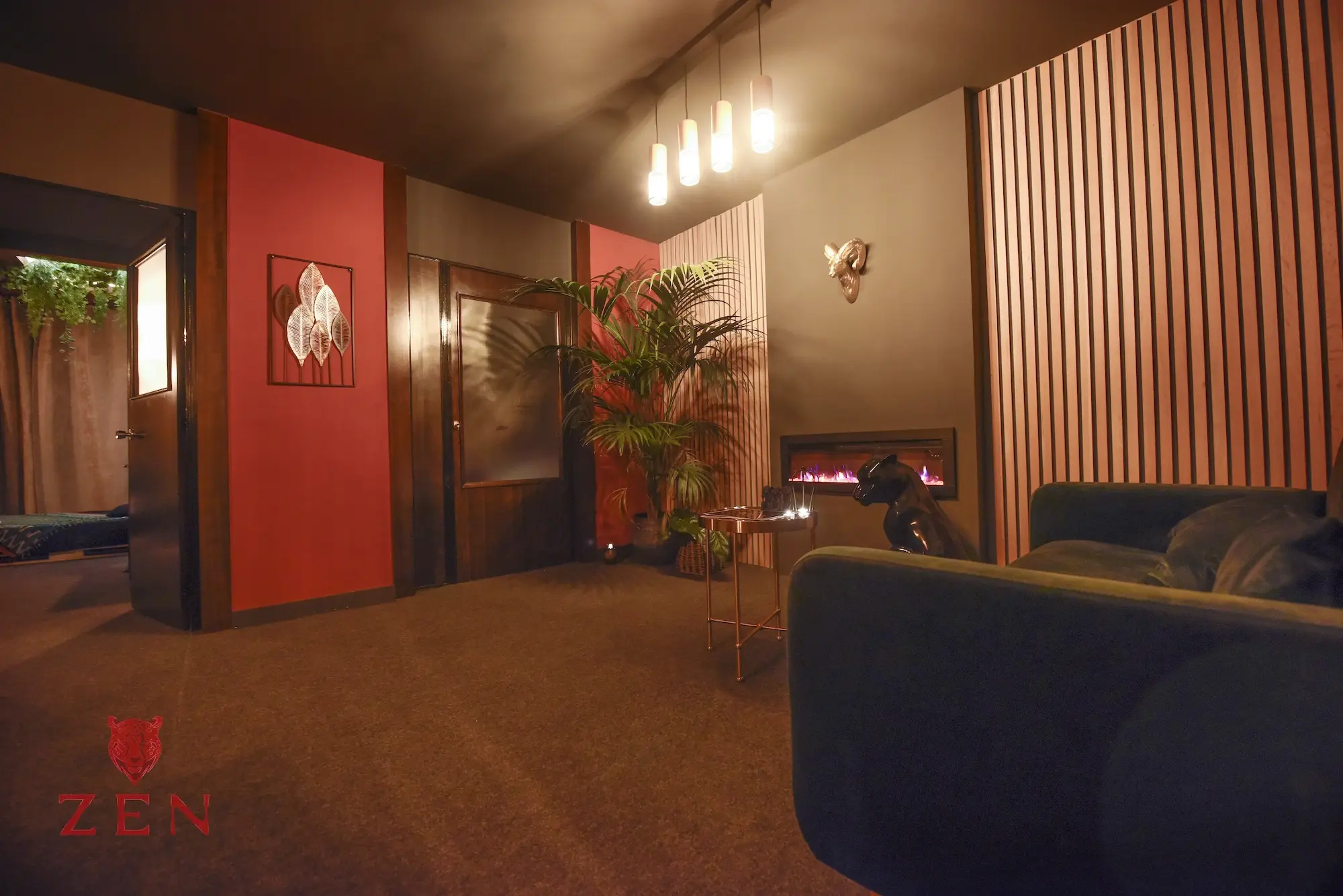Golden suite with ambient lighting and massage table